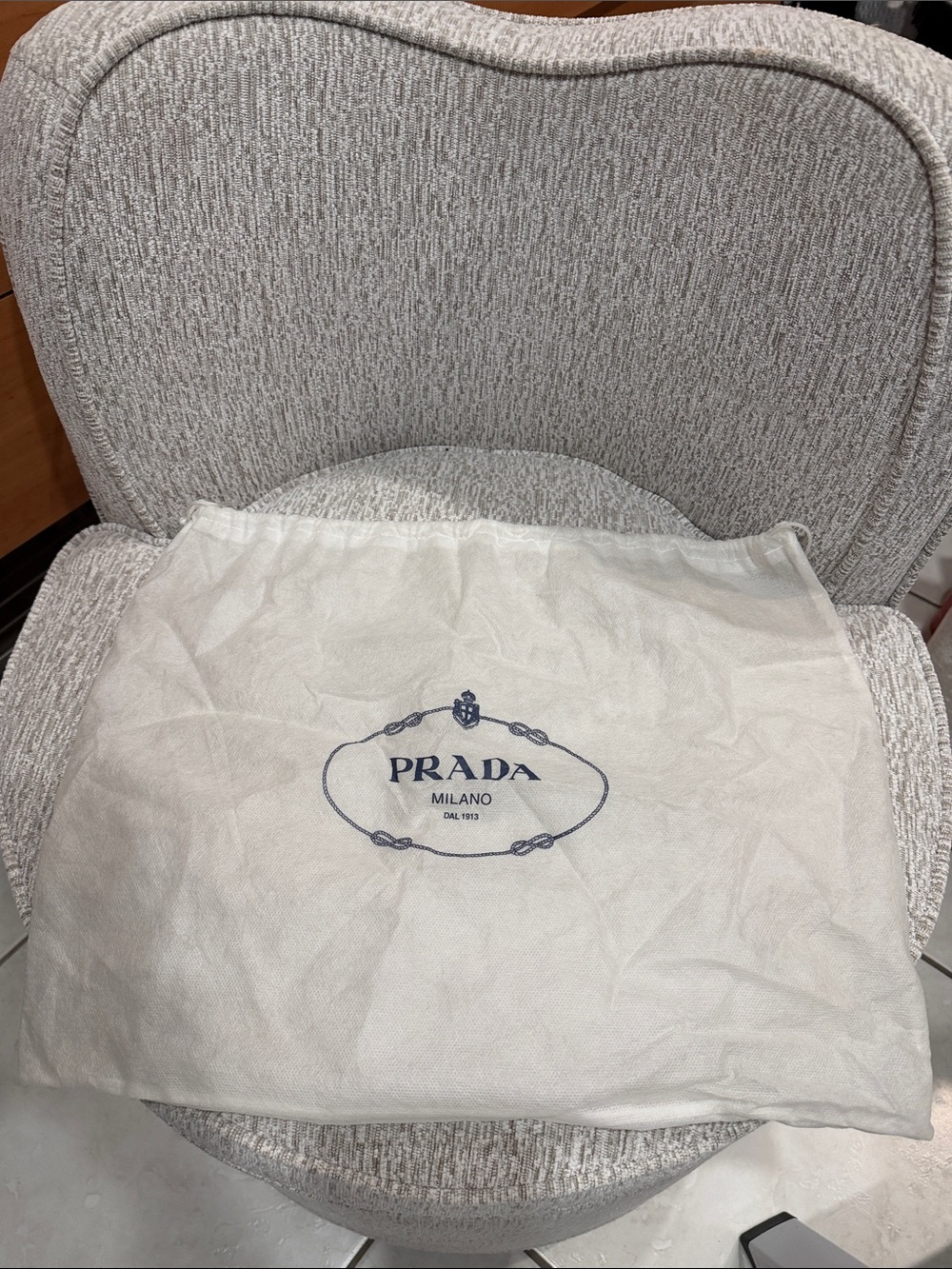 Prada Cream Dust Bag with Navy Logo